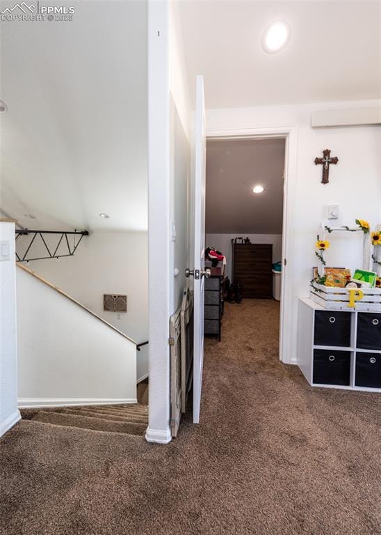 hall featuring carpet floors, baseboards, and recessed lighting