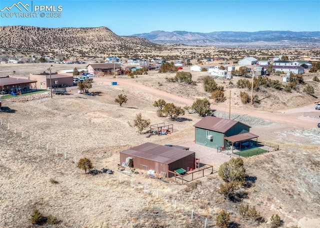 aerial view with view of desert and a mountain view