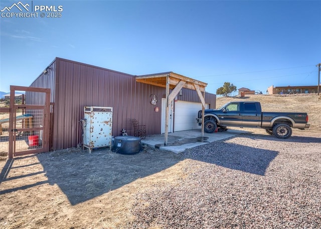 exterior space featuring a garage