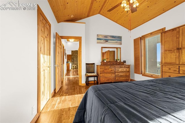 bedroom with lofted ceiling, ceiling fan, wooden ceiling, and wood finished floors