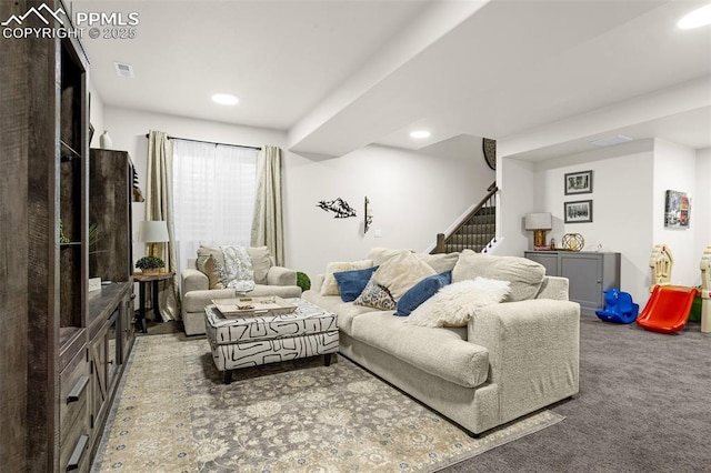 living room featuring carpet floors, stairs, visible vents, and recessed lighting