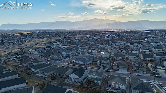 bird's eye view with a residential view and a mountain view