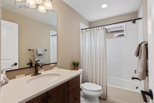 bathroom with toilet, shower / bathtub combination with curtain, backsplash, and vanity