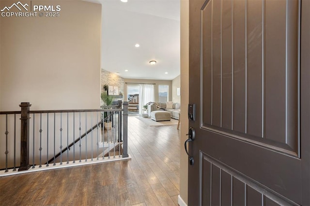 entryway with recessed lighting and wood-type flooring