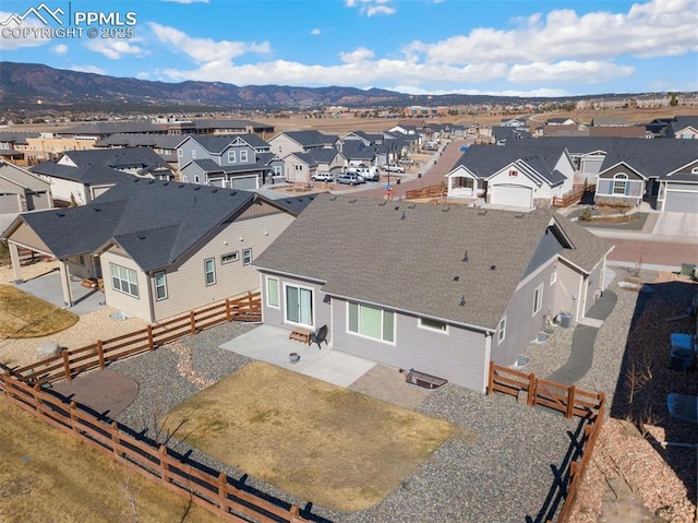 aerial view with a residential view and a mountain view