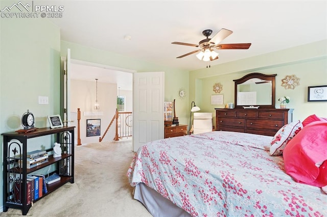 bedroom featuring carpet and a ceiling fan