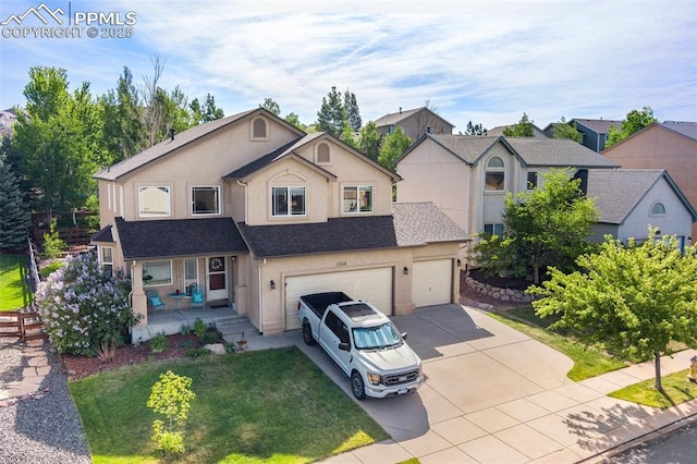 traditional-style house with a porch, a front lawn, concrete driveway, and stucco siding