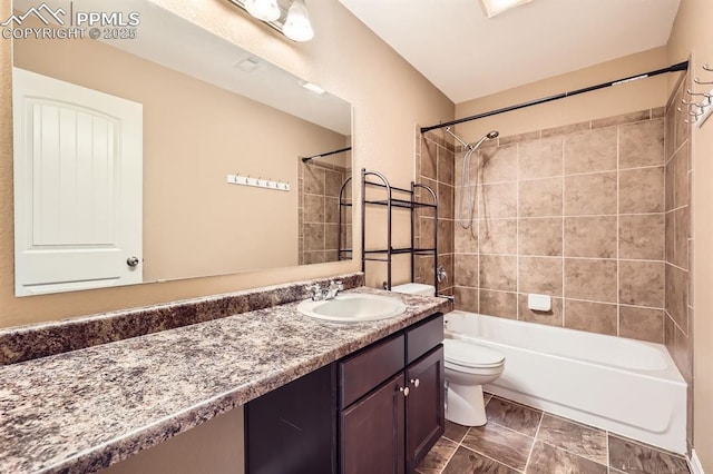 full bathroom featuring toilet, shower / washtub combination, and vanity