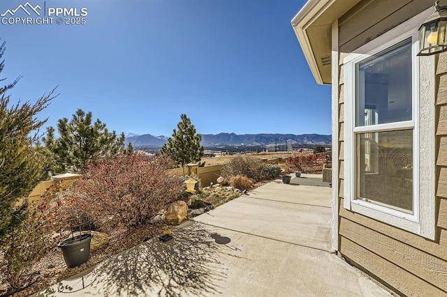 view of patio featuring a mountain view