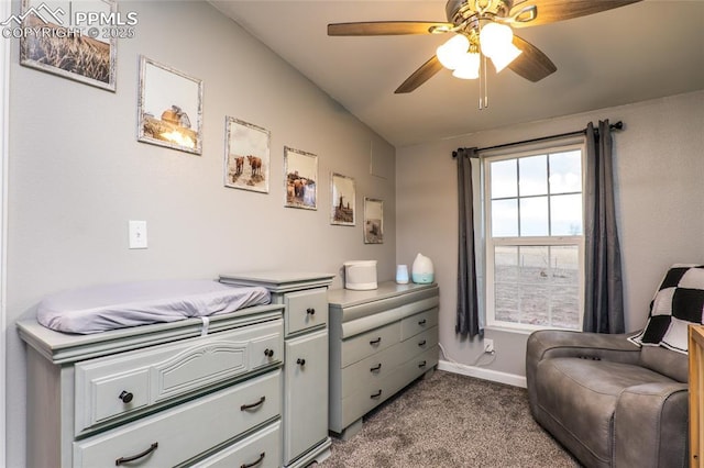 interior space with ceiling fan and baseboards