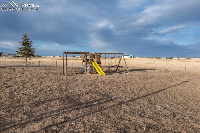 view of play area with fence