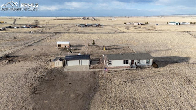 bird's eye view featuring a rural view and a desert view