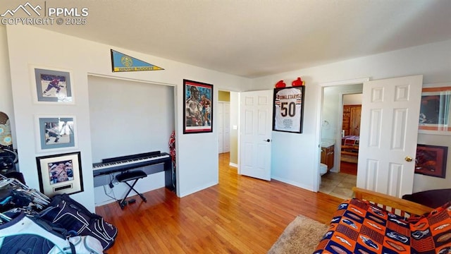 interior space with light wood-style flooring and baseboards