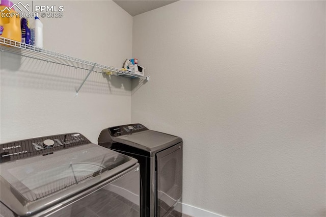 laundry area featuring laundry area and separate washer and dryer