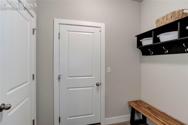 mudroom featuring baseboards