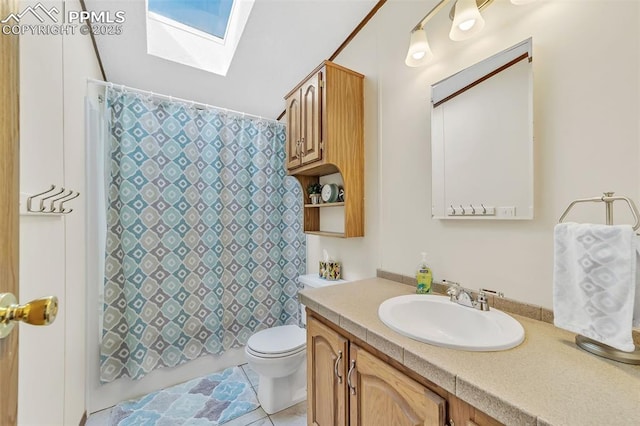 bathroom featuring tile patterned flooring, toilet, a skylight, vanity, and shower / bathtub combination with curtain