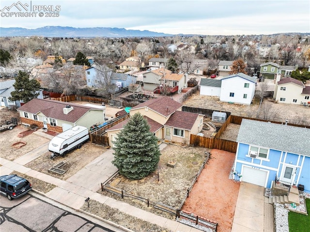 bird's eye view with a residential view and a mountain view