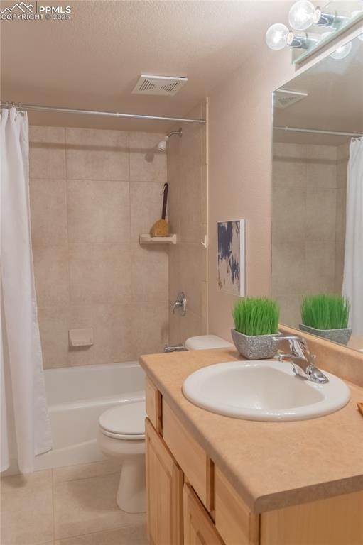 bathroom with toilet, shower / tub combo, vanity, visible vents, and tile patterned floors