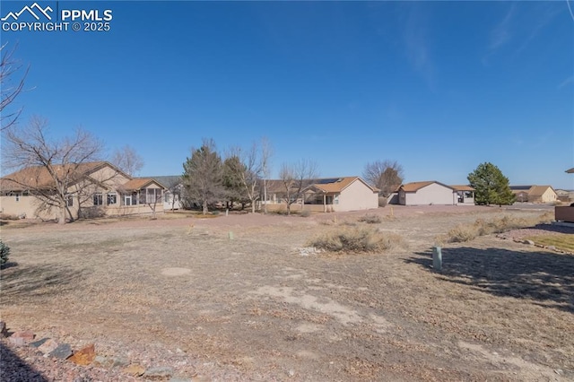 view of yard with a residential view