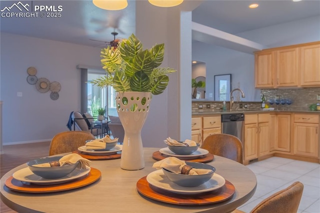 interior space featuring light tile patterned floors, baseboards, and recessed lighting