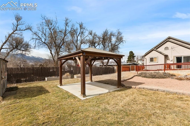 view of yard with a gazebo, a patio, and a fenced backyard