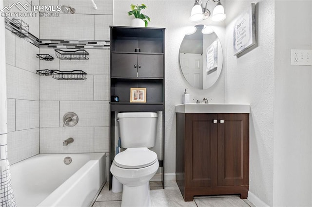 full bath featuring baseboards, toilet, bathtub / shower combination, tile patterned floors, and vanity