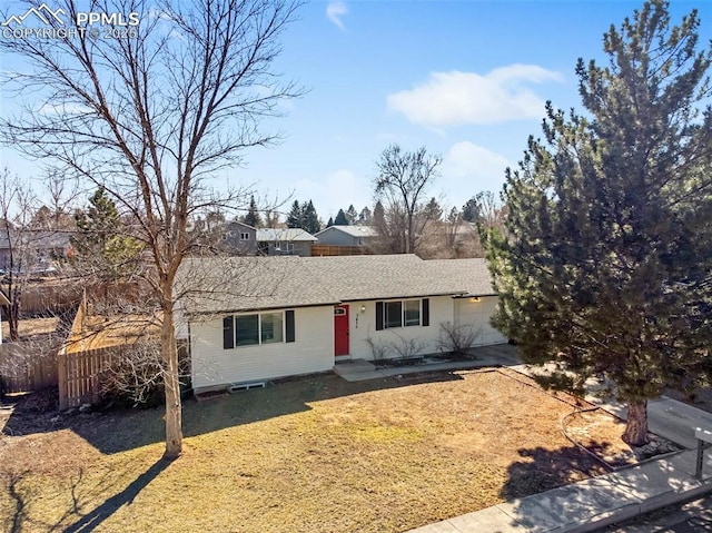 single story home featuring driveway and an attached garage