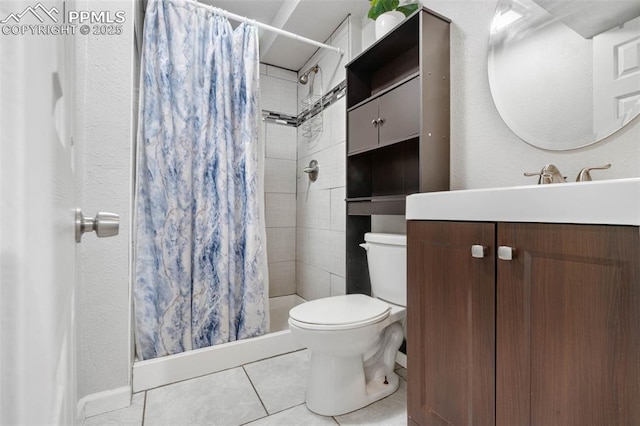 full bathroom with toilet, a stall shower, tile patterned flooring, vanity, and a textured wall