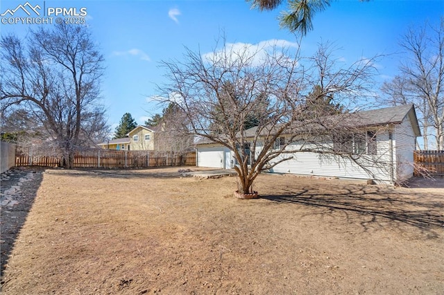 view of yard featuring fence