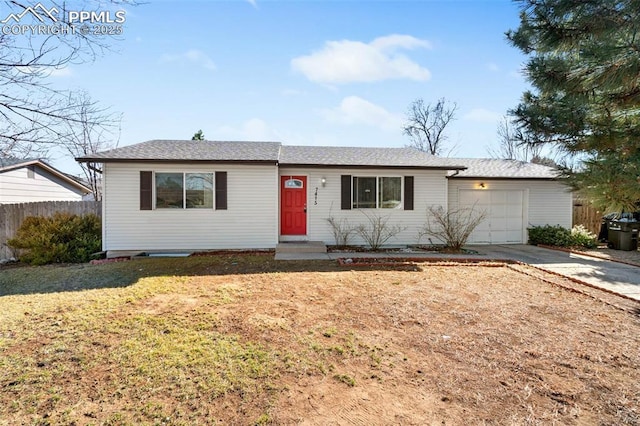 ranch-style home with fence, entry steps, a front yard, a garage, and driveway