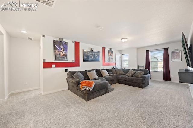 carpeted living room featuring visible vents and baseboards