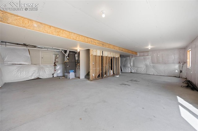 basement featuring heating unit