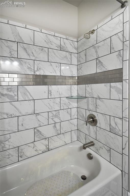 bathroom featuring shower / washtub combination