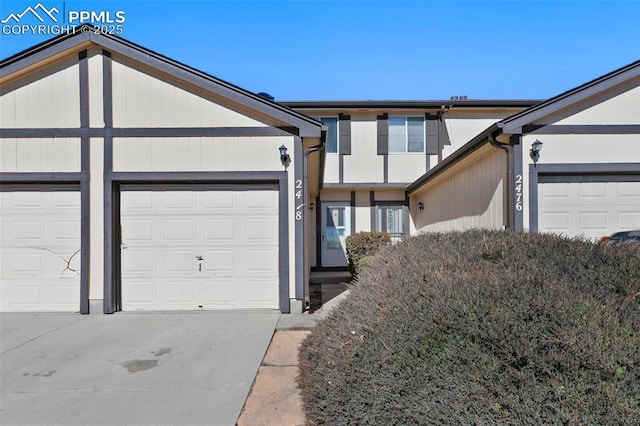 view of front of property featuring driveway and an attached garage