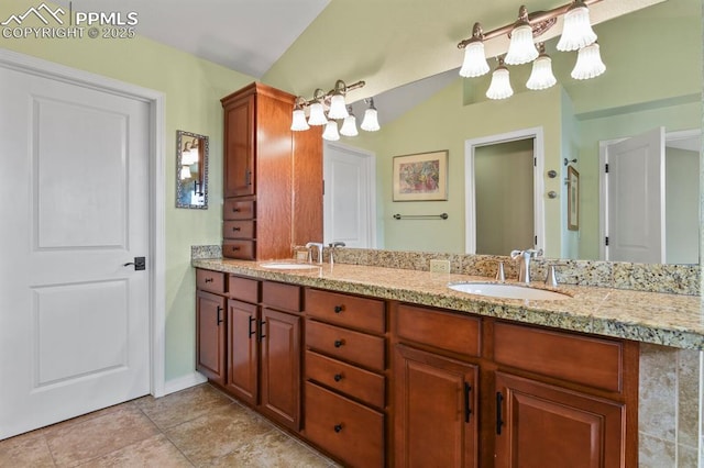 bathroom featuring lofted ceiling, double vanity, tile patterned flooring, and a sink