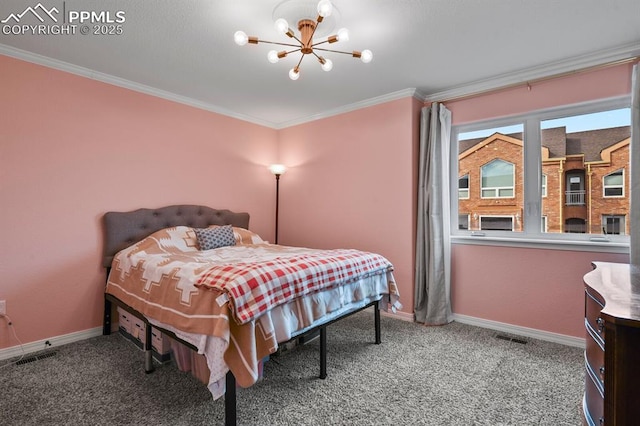 bedroom with ornamental molding, carpet, and baseboards