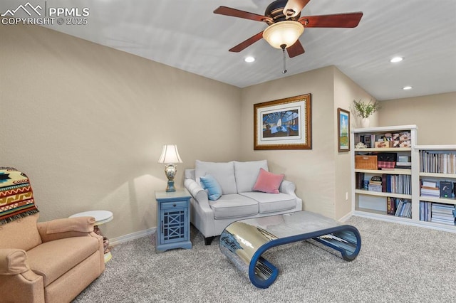 carpeted living area with baseboards, a ceiling fan, and recessed lighting