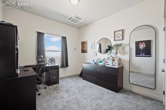 1086 N Purcell Blvd, Pueblo West, CO 81007 - carpeted office space featuring visible vents and baseboards