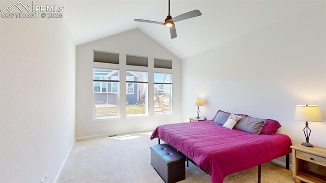 bedroom with vaulted ceiling, carpet floors, ceiling fan, and baseboards