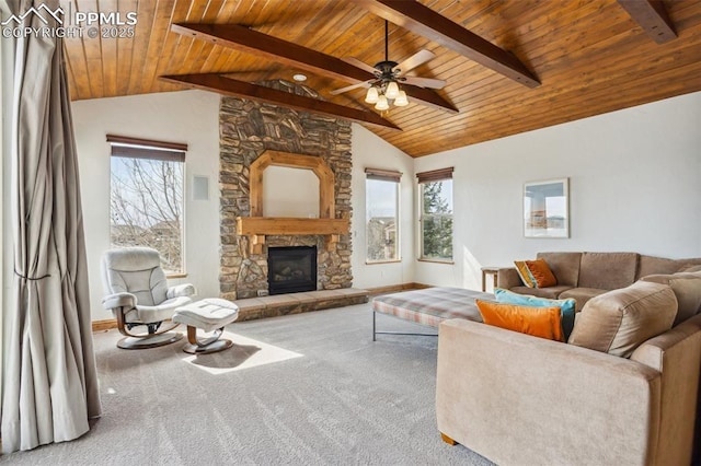 living area featuring wooden ceiling, plenty of natural light, and lofted ceiling with beams