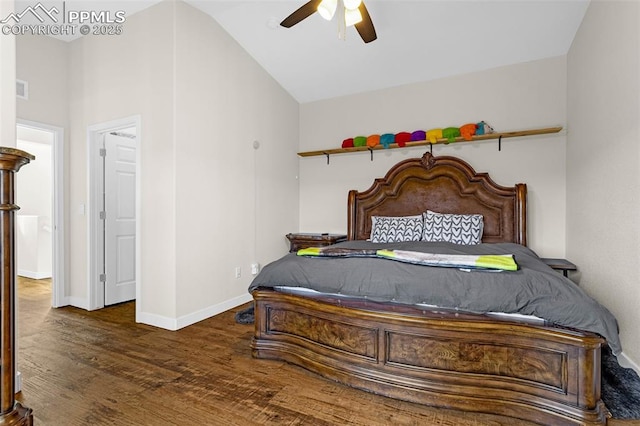 bedroom featuring a ceiling fan, wood finished floors, baseboards, visible vents, and vaulted ceiling