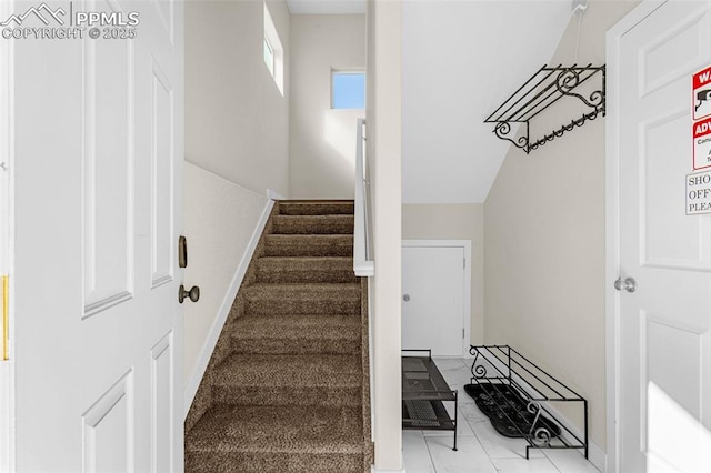 stairway with baseboards