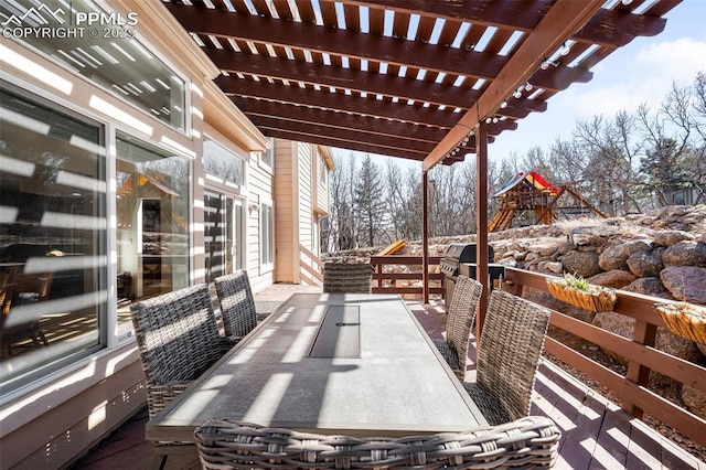 view of patio / terrace with outdoor dining area, area for grilling, and a pergola