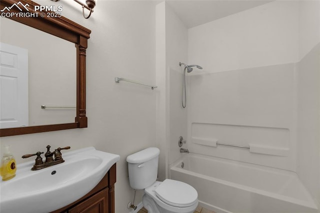 bathroom with toilet, vanity, and bathtub / shower combination