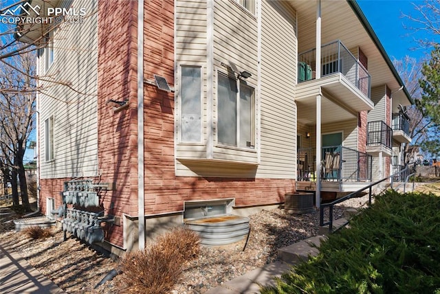 view of home's exterior with central air condition unit