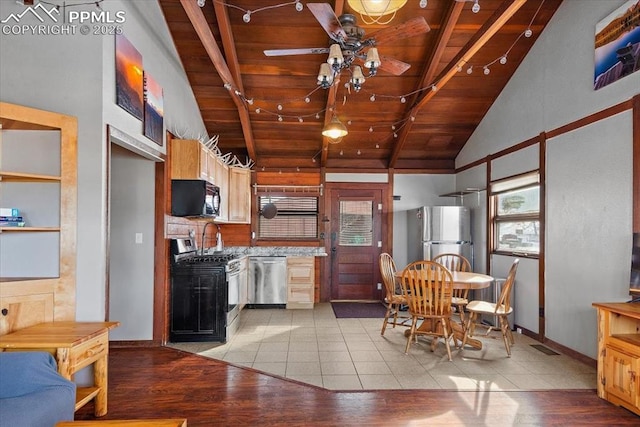 kitchen with wooden ceiling, light wood finished floors, stainless steel appliances, and a ceiling fan