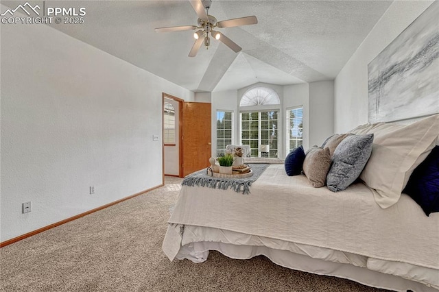 bedroom with carpet floors, lofted ceiling, ceiling fan, a textured ceiling, and baseboards