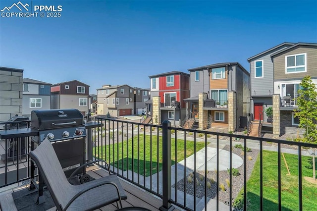 balcony with a residential view and grilling area