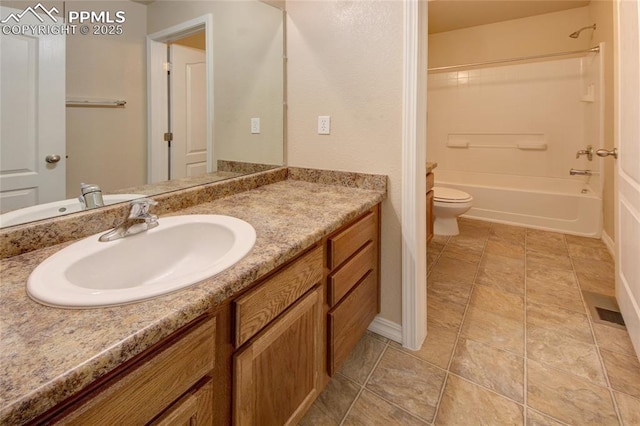 bathroom with vanity, toilet, and bathing tub / shower combination