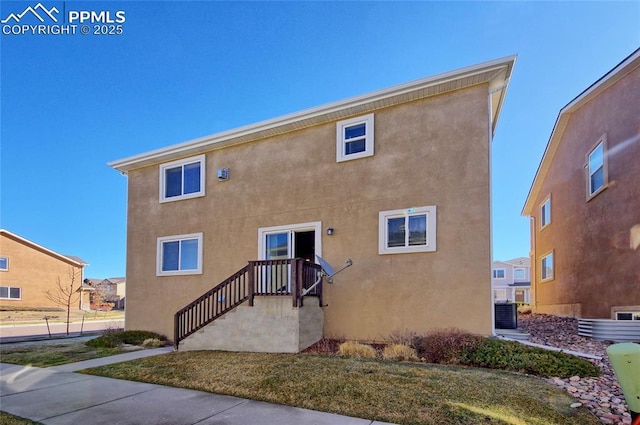 exterior space with stucco siding